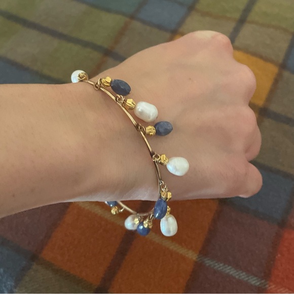 Gold plated bangle with white and blue mother of pearl. - Picture 2 of 4